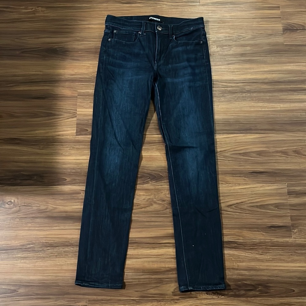 Express Mid Rise Super Skinny Performance Jeans in size 4R.